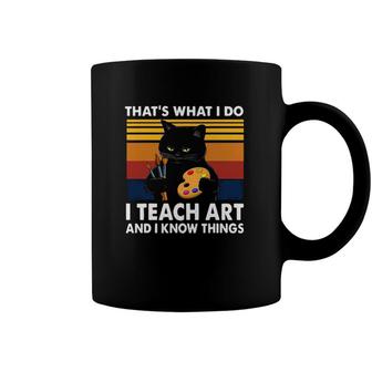 Grumpy Black Cat Thats What I Do I Teach Art And Know Things Coffee Mug | Mazezy