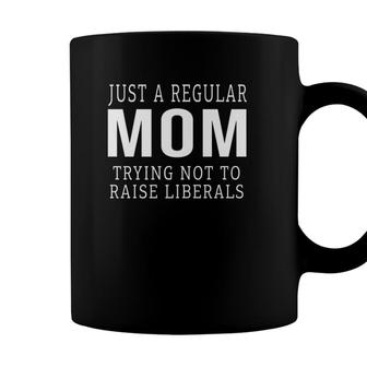 Just A Regular Mom Trying Not To Raise Liberals Coffee Mug - Seseable