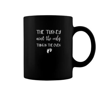 The Turkey Aint The Only Thing In The Oven Pregnant Coffee Mug - Monsterry