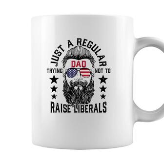 Just A Regular Dad Trying Not To Raise Liberals Coffee Mug - Seseable