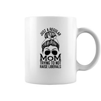Just A Regular Mom Trying To Not Raise Liberals Black Graphic Coffee Mug - Seseable