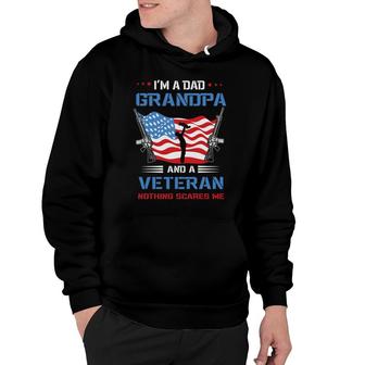 I Am A Dad Grandpa And A Veteran Holding A Gun Nothing Scares Me Hoodie - Seseable