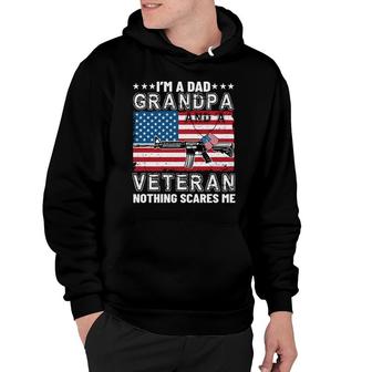 I Am A Dad Grandpa And A Veteran Takes A Gun In The Battlefield Nothing That Scares Me Hoodie - Seseable