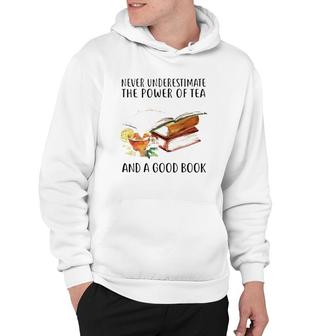 Never Underestimate The Power Of Tea And A Good Book Hoodie - Seseable