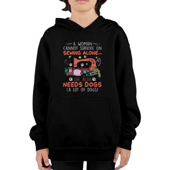 A Woman Cannot Survive On Sewing Alone She Also Needs Dogs A Lot Of Dogs Youth Hoodie - Seseable