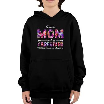 Rn Nurse Im A Mom And A Caregiver Nothing Scares Me Youth Hoodie | Mazezy