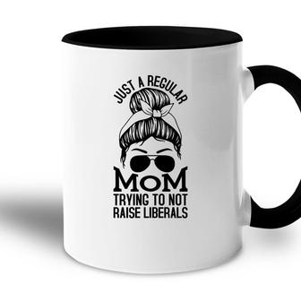Just A Regular Mom Trying To Not Raise Liberals Black Graphic Accent Mug