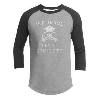 1St Grade Level Complete First Grade Graduation Video Gamer Youth Raglan Shirt - Seseable