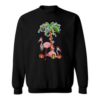 Christmas Flamingo Funny Santa By Sea Palm Tree Lights Sweatshirt | Mazezy