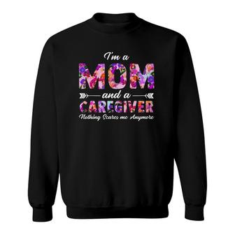 Rn Nurse Im A Mom And A Caregiver Nothing Scares Me Sweatshirt | Mazezy