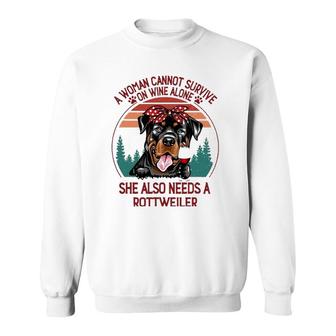 A Woman Cannot Survive On Wine Alone Rottweiler Dog Lover Sweatshirt - Seseable