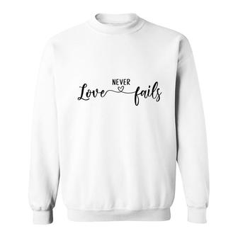 Bible Verse Black Graphic Love Never Fails Christian Sweatshirt - Seseable