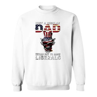 Fathers Day Just A Regular Dad Trying Not To Raise Liberals Sweatshirt - Seseable