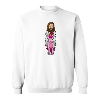 Jesus Riding A Pink Unicorn Funny Christmas Easter Sweatshirt - Monsterry