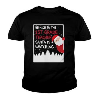 Be Nice To The 1St Grade Teacher Santa Is Watching Funny Youth T-shirt - Seseable