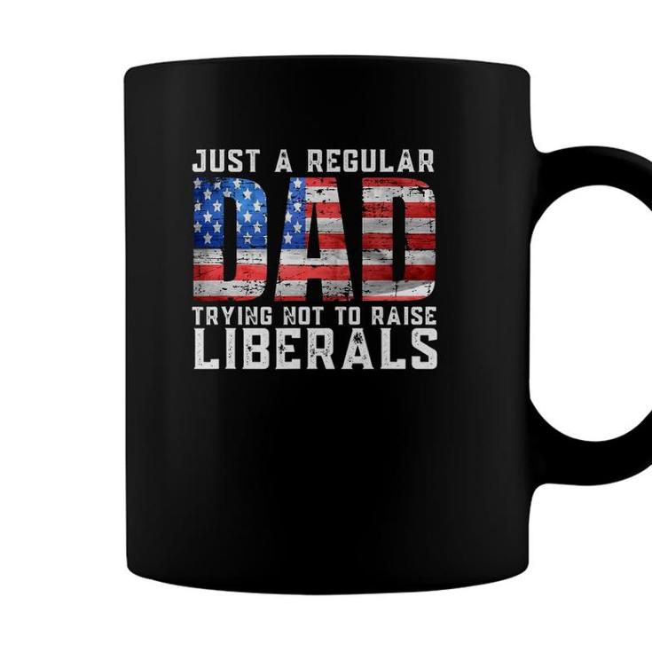 Just A Regular Dad Trying Not To Raise Liberals Coffee Mug