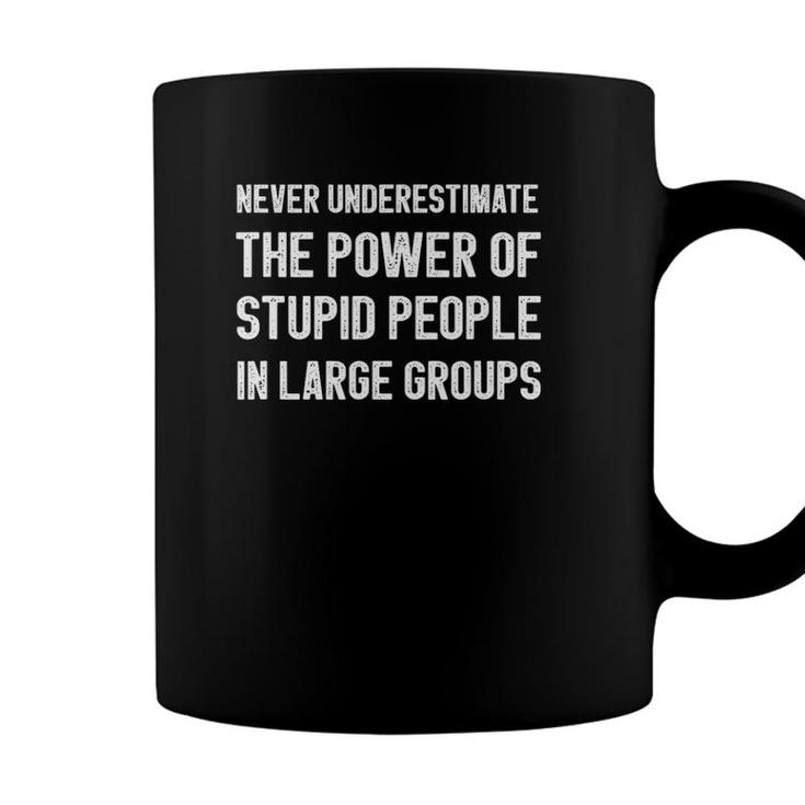 Never Underestimate The Power Of Stupid People Crowdfunding Coffee Mug