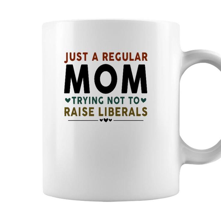 Just A Regular Mom Trying Not To Raise Liberals Heart Coffee Mug