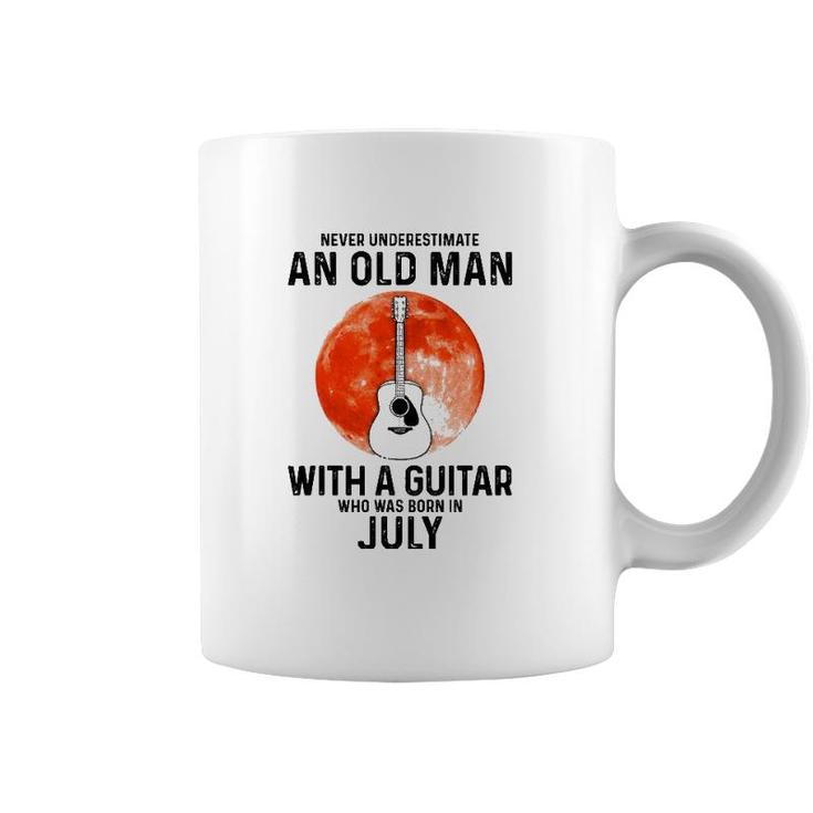 Never Underestimate An Old Man With A Guitar July Coffee Mug