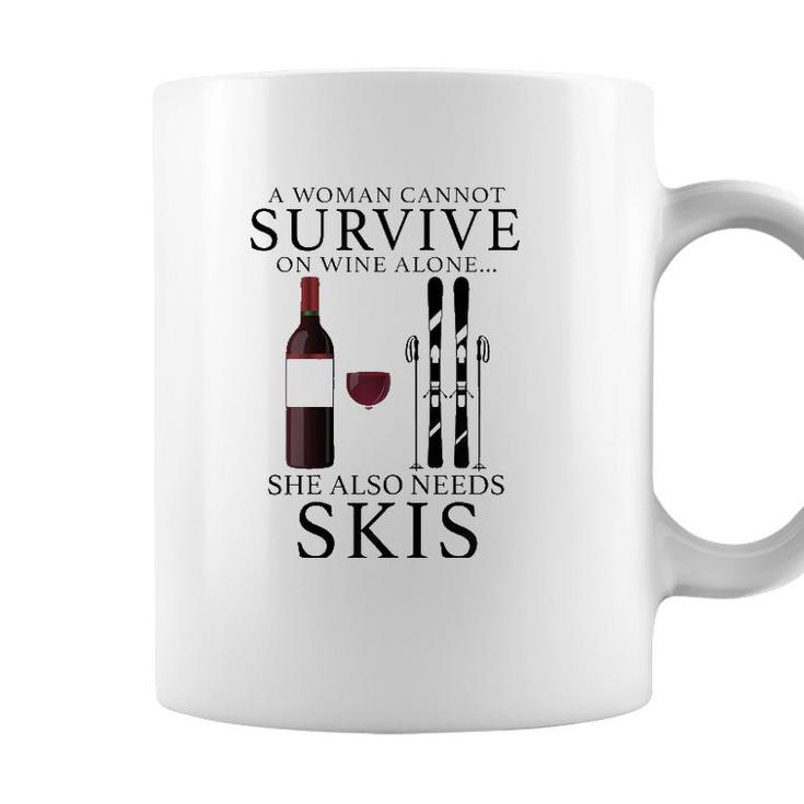Womens A Woman Cannot Survive On Wine Alone She Also Needs Skis Coffee Mug