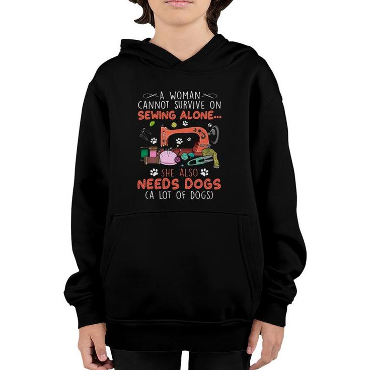 A Woman Cannot Survive On Sewing Alone She Also Needs Dogs A Lot Of Dogs Youth Hoodie