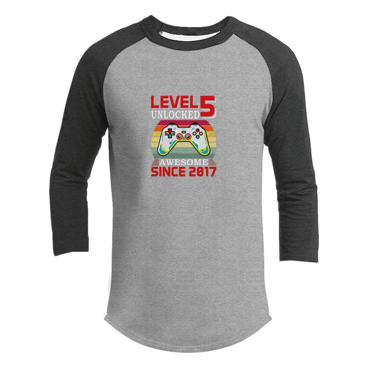 Level 5 Unlocked Awesome Since 2017 5Th Birthday Youth Raglan Shirt